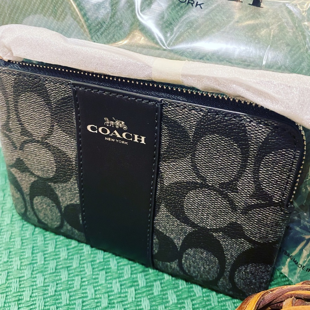 COACH black on black Wristlet